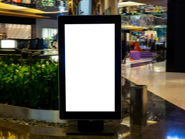 Blank advertising display in shopping centre